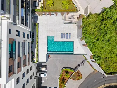an overhead view of a building with a swimming pool at MK Apart II in Funchal