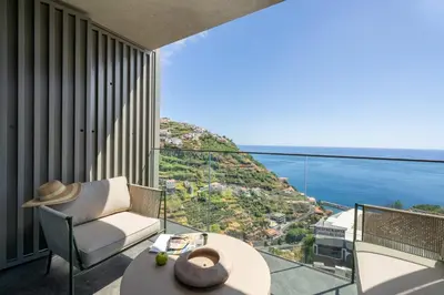 a room with a view of the ocean at Calheta Hills III by An Island Apart in Calheta