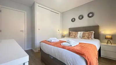 a bedroom with a bed with towels on it at Sea and Sun 4 You - BeatMann in Funchal