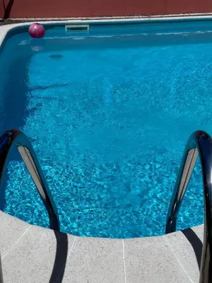 a swimming pool with a ball in the water at VILLA Valhalla Private heated swimming-pool in Funchal