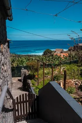a stairway with a view of the ocean at GuestReady - Magical refuge in Madeira in Seixal