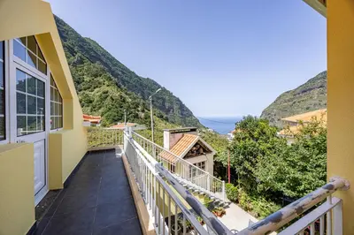 a balcony with a view of the mountains at Casa Golino by YOUR KEY in São Vicente