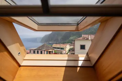 a view from the window of a house at Casa Jardim Celeste in Seixal