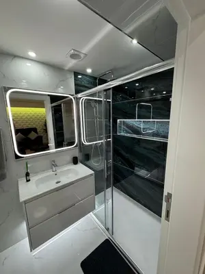 a bathroom with a sink and a shower at Funchal Center Accomodation in Funchal