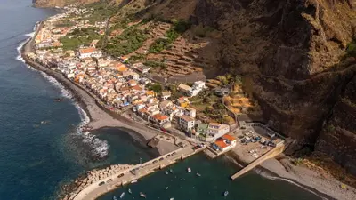an aerial view of a village on the edge of a cliff at No Stress House in Paul do Mar