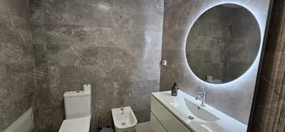 a bathroom with a sink and a mirror at Achada View by Rentallido in Funchal