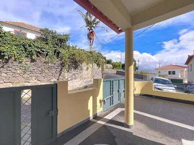 a front door of a house with a rock wall at Gaula Family Haven by Atlantic Holiday in Gaula