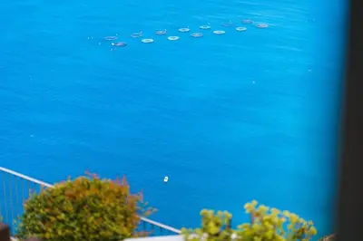 a view of a large body of water with boats at GuestReady - Exquisite stay with sea views in Calheta