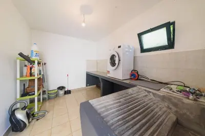 a room with a counter with a microwave on it at Casa do Massapez by Mth in Santa Cruz