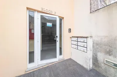 an entrance to a building with a glass door at Apartamento Vieira by Mth in Campanário