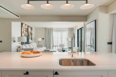 a kitchen with a bowl of fruit on a counter at Villa Mangoni - Brand New Luxury Villa in Funchal