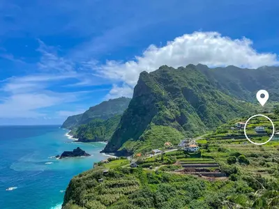 a view of a mountain next to the ocean at São Cristóvão AL in Boaventura