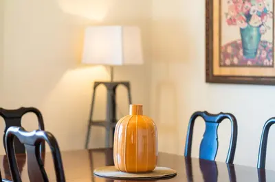 a pumpkin sitting on top of a table with chairs at GuestReady - Sea-View Retreat in Madeira in Funchal