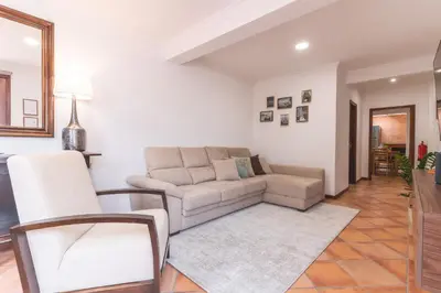 a living room with a couch and a chair at Stero House by Atlantic Holiday in Caniçal