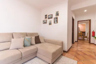a living room with a couch and a table at Stero House by Atlantic Holiday in Caniçal