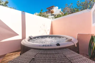 a hot tub sitting on top of a patio at Stero House by Atlantic Holiday in Caniçal
