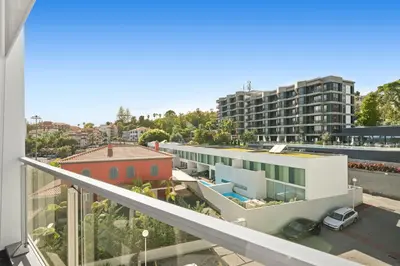 a view from the balcony of a building at Vista Savoy Apartamento in Funchal