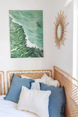 a bedroom with a bed with blue and white pillows at Casa Phoebe - NEW Renovated Burgau Apartment Sleeps 5 - Beach 1 min in Burgau