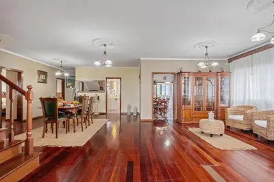 a living room and dining room with a table and chairs at Ocean Hill View By Zest&Guest in Câmara de Lobos