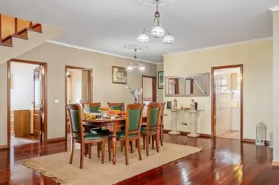 a dining room with a table and chairs at Ocean Hill View By Zest&Guest in Câmara de Lobos