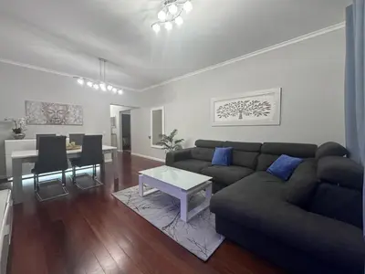 a living room with a couch and a table at Ocean View in Santa Cruz