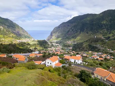 a village in a valley with mountains at Vista do Vale, By OP in São Vicente