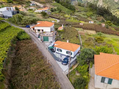 an aerial view of a house with an orange roof at Vista do Vale, By OP in São Vicente