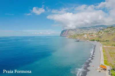 an aerial view of a beach and the ocean at FLH Oceanfront Luxury at Madeira Palace Residence in Funchal