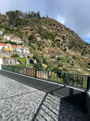 a bridge with a mountain in the background at Casinha da Montanha - Paraíso 7 in Ribeira Brava