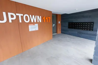 a room with a door with the word uptown at Luxury LeilaMar Apartment - Modern Retreat in Funchal