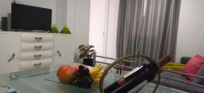 a glass table with a bowl of fruit on it at Sol & Maré in Calheta