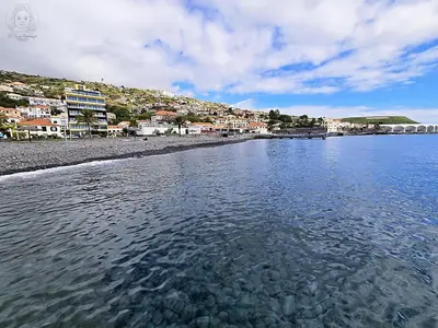 a view of a beach with houses and the water at Dª Xica Holidays in Santa Cruz