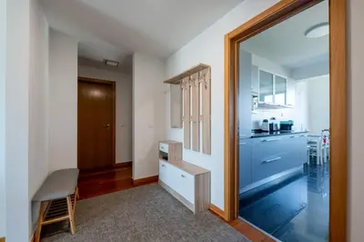 a gym with two tread machines and a treadmill at Nomad Horizon Spacious Apartment with Pool & Gym in Funchal