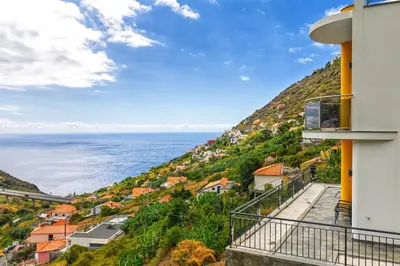 a view of the ocean from a building at Sonhos na Iha III by Holiday Rental Madeira in Campanário