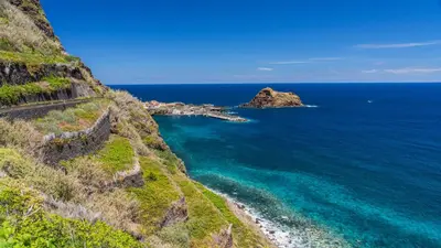 a view of the ocean from a cliff at Sonhos na Iha III by Holiday Rental Madeira in Campanário