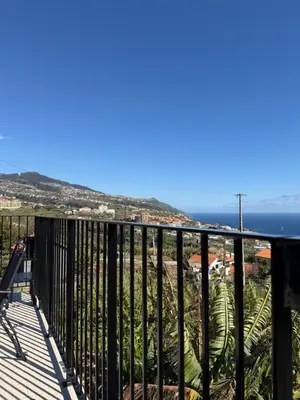 a balcony with a view of the ocean at Casa da Quinta in Estreito da Calheta