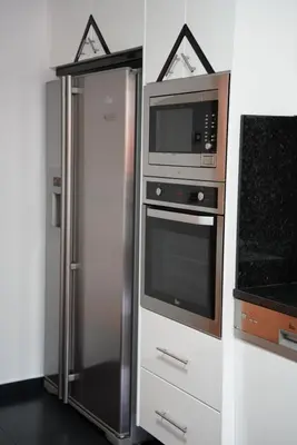 a mirror in a room with a living room at Charm Residence Apartment - Free Park in Funchal