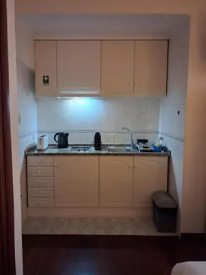 a kitchen with a sink and a counter top at Ribeira Brava Studios - G in Ribeira Brava