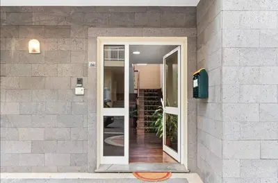 a door leading into a building with a staircase at Ribeira Brava Studios - P in Ribeira Brava
