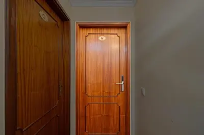 a wooden door in a hallway next to a wooden door at Ribeira Brava Studios - N in Ribeira Brava