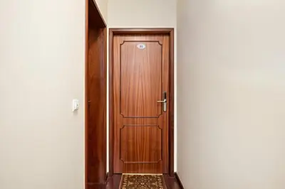 a wooden door in the middle of a hallway at Ribeira Brava Studios - H in Ribeira Brava