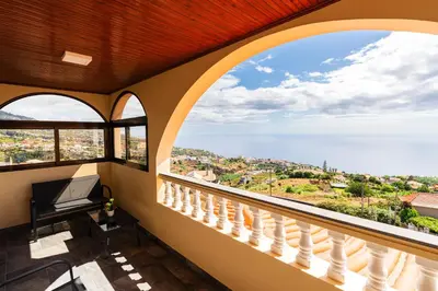 a balcony with a view of the ocean at Michaels View - Calheta in Estreito da Calheta