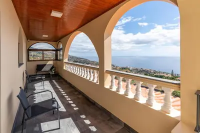 a balcony with a view of the ocean at Michaels View - Calheta in Estreito da Calheta