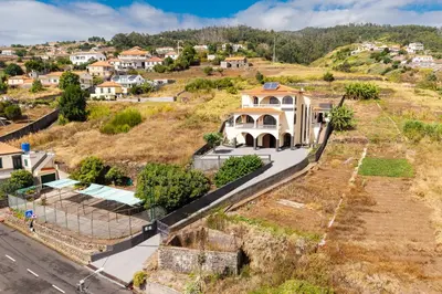 an aerial view of a house on a hill at Michaels View - Calheta in Estreito da Calheta