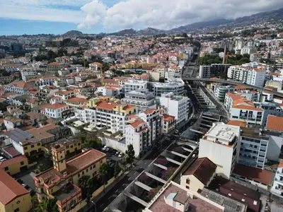 an aerial view of a city with buildings at Jasmine Whisper by Elysian in Funchal