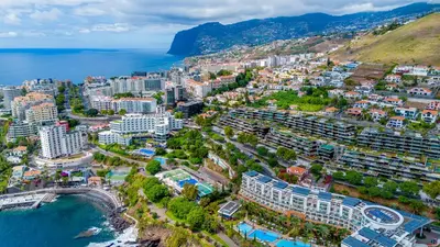 an aerial view of a city next to the ocean at Savoy Luxury Residence Apartment in Funchal