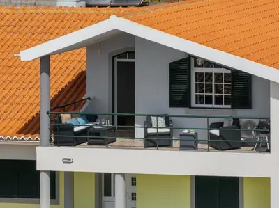 an image of a house with an orange roof at OurMadeira - Ponta do Sol SeaView in Relógio do Poiso