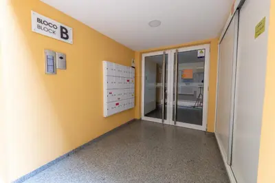 an empty hallway of a hospital with a glass door at City Center Apartment with Parking - 2stay in Funchal