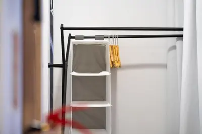 a refrigerator with its door open with shelves at Calma Retreat - Pool & Lodge in Câmara de Lobos