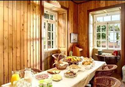 a table with a bunch of food on it at Casa da Fajã Alta in São Jorge